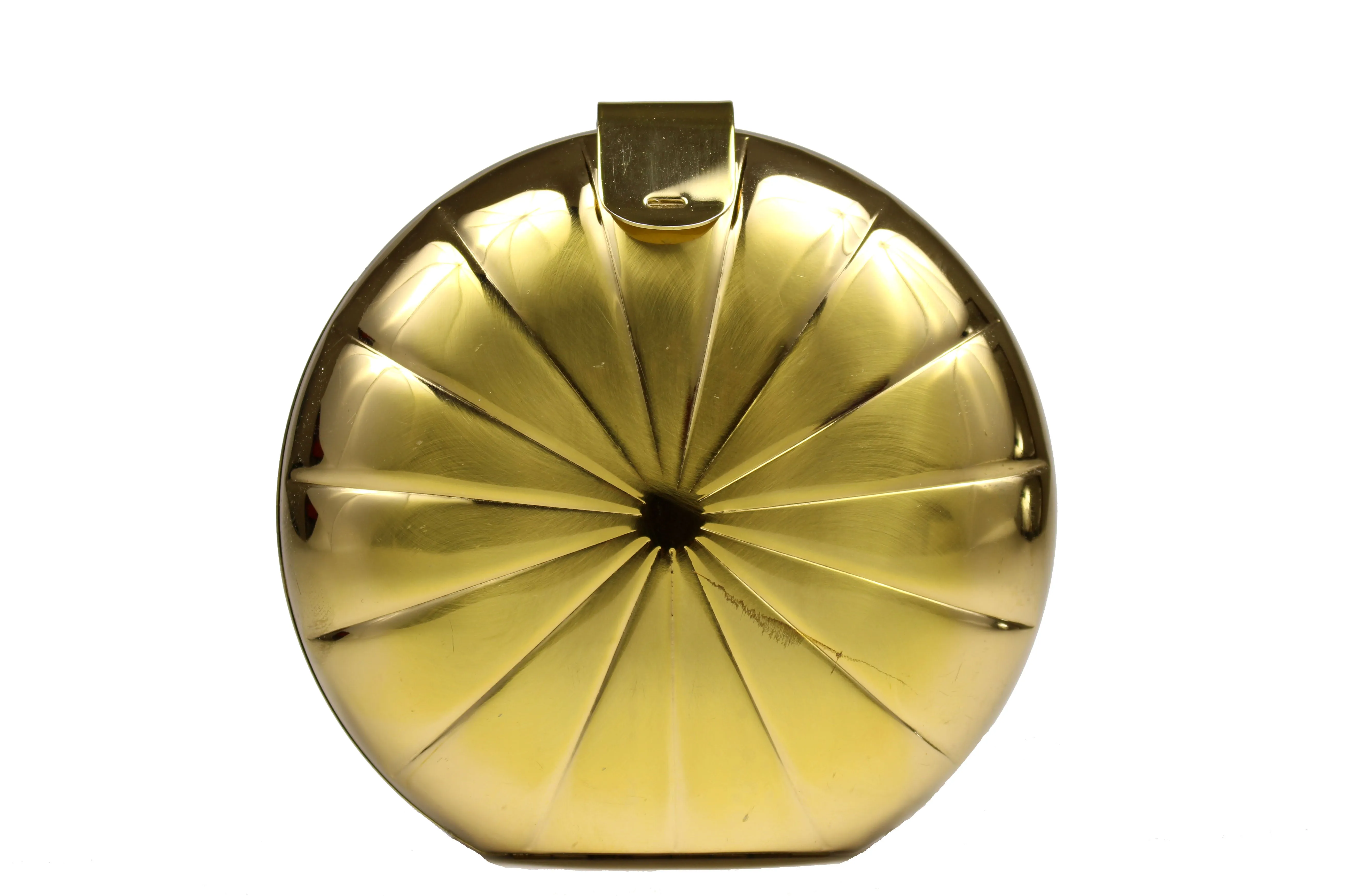 Metallic gold circular clutch with radial embossing